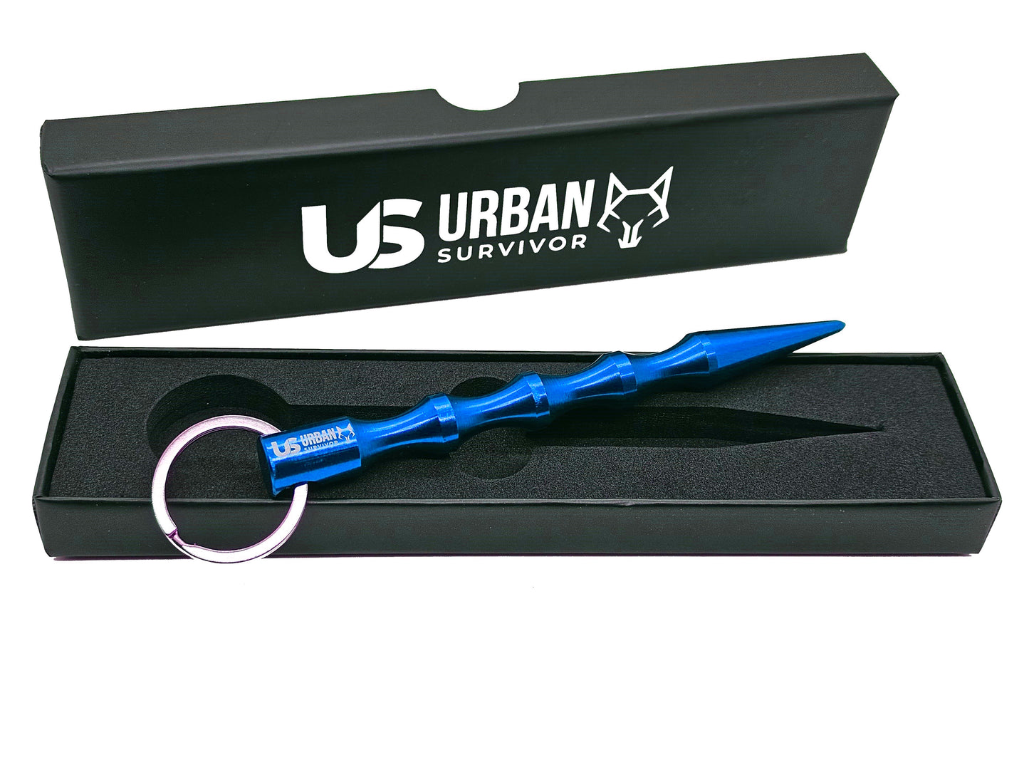 Blauer Kubotan mit Schlüsselring in einer hochwertigen Verpackung.