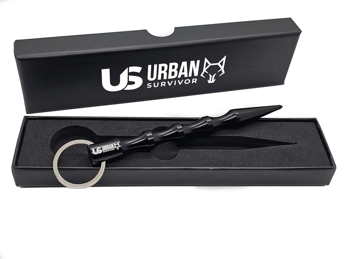 schwarzer Kubotan zur Selbstverteidigung in hochwertiger Verpackung.